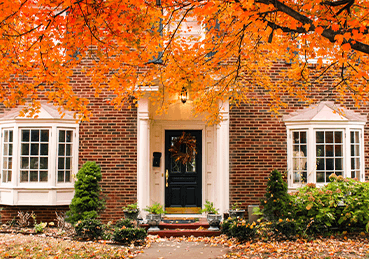 Outside of home with fall foliage