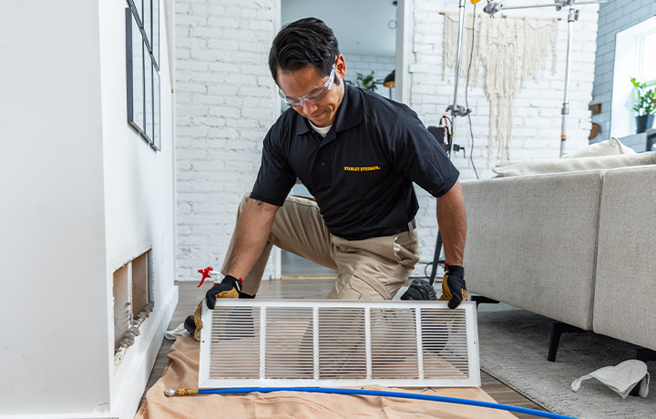 Stanley Steemer Technician Inspecting Air Ducts in Nashville, TN