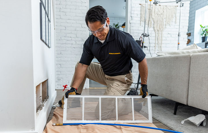 Stanley Steemer Technician Inspecting Air Ducts in Santa Rosa, CA Home Stanley Steemer technician inspecting air ducts in Santa Rosa, CA home