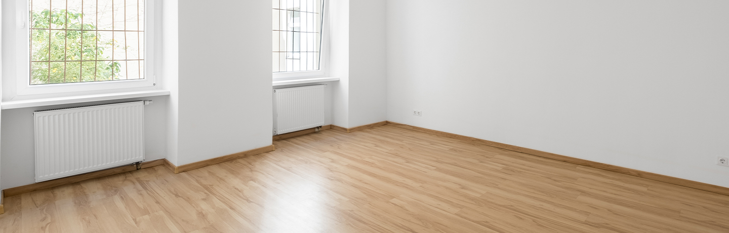 Empty living room of new home with clean hardwood