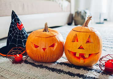 Jack-O-Lanterns on clean area rug