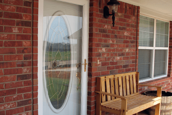 Storm door placed before the front door of home